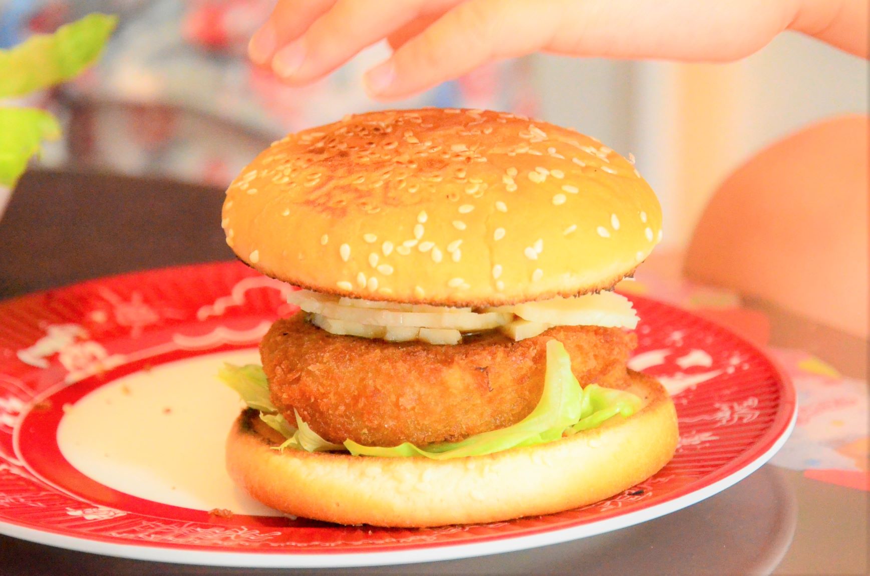 Completion of handmade croquette burger